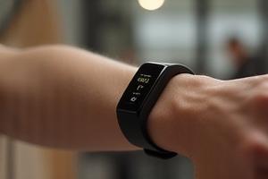 WHOOP 4.0 fitness tracker band worn on a wrist.